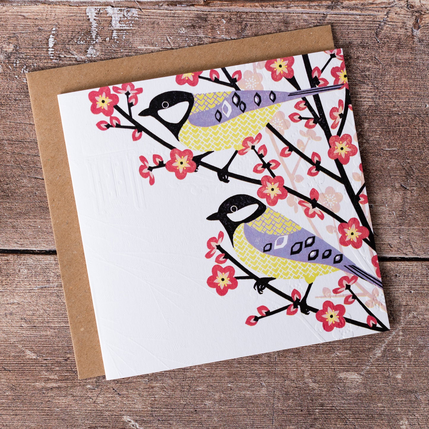 This high quality, linocut printed, Great Tit card has been handcrafted by the talented Ashley Hutchinson in his rural West Sussex garden studio. This design features a two Great Tits in a tree on an embossed card background.